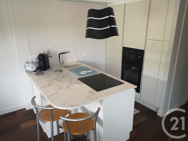 Appartement T2 à louer - 3 pièces - 67.44 m2 - PLOEMEUR - 56 - BRETAGNE - Century 21 Ploemeur Immobilier